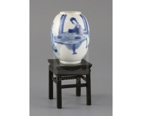 A Chinese blue and white small ovoid vase, Kangxi period, painted with two ladies seated at a table playing weiqi in a garden