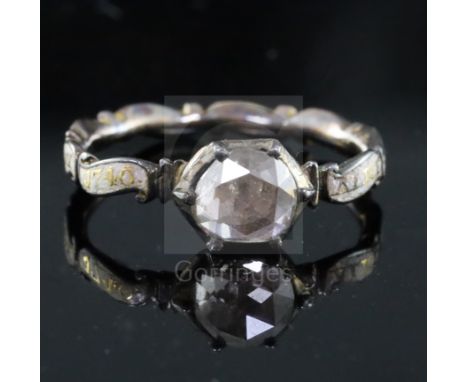 A George II gold, white enamel and rose cut diamond set mourning ring, with rock crystal panel en verso containing hair?, the