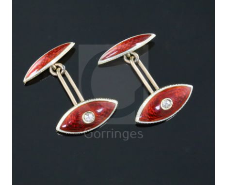 A pair of early 20th century 15ct, red and white enamel and diamond set navette shaped cufflinks.