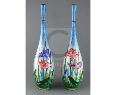 A pair of large Japanese ginbari cloisonne enamel bottle vases, c.1910, each decorated in silver wirework with raised irises 