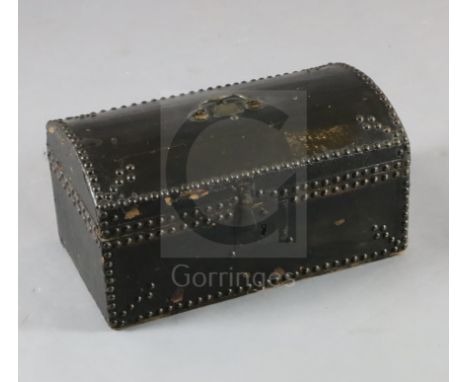 An 18th century small domed topped leather trunk, with brass studded borders, the lid interior bearing a label - ''John Sheph