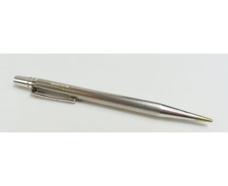 A silver Yard-O-Led propelling pencil, with engine turned decoration and vacant cartouche