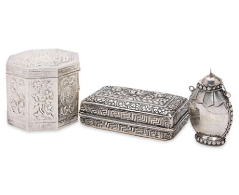 A GROUP OF ORIENTAL SILVER / WHITE METAL ITEMS
Comprising: an octagonal box, decorated with dragons, panels of foliage and sh