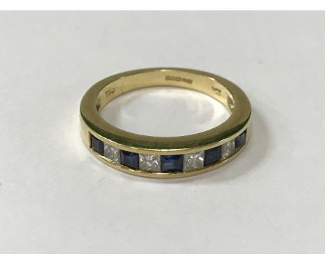 An 18 carat gold sapphire and diamond half eternity ring, 4 g, size O/P 