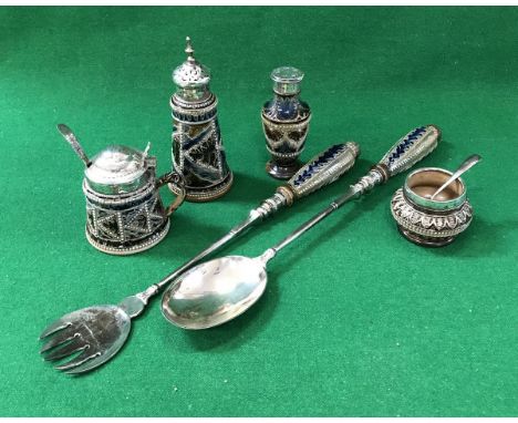 A Victorian Doulton Lambeth pottery composite cruet set comprising two peppers, lidded mustard and open salt with silver moun