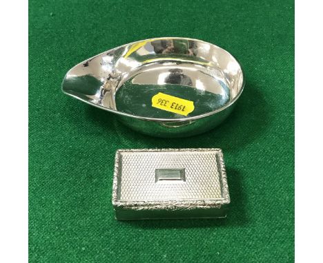A 19th Century engine turned silver snuff box of rectangular form (maker's mark rubbed), together with a modern silver pap bo