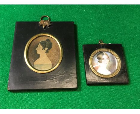 A 19th Century miniature of a young woman in pearl necklace, housed in an ebonised frame, together with a further 19th Centur