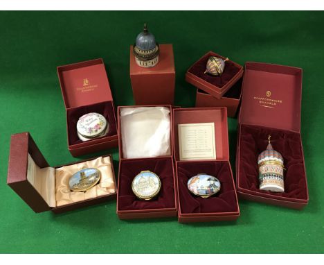 A collection of 25 various Staffordshire enamel pill boxes including St. Paul's Cathedral and Punch and Judy, together with o