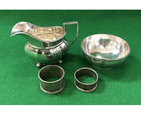 A Victorian silver bowl on circular foot, inscribed "William Trant Chambers from Granny Feby 6th 1882", a silver cream jug by