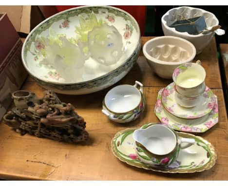 Two vaseline glass light shades, together with two further glass light shades, a Burslem "Kelmscott" pattern wash bowl, two j