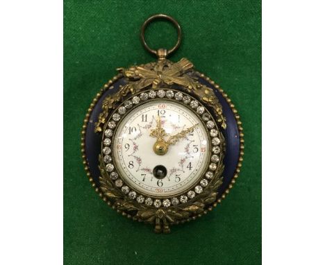 A 19th Century French hanging clock with gilt mounts on a painted blue body, the white enamel dial set with Arabic numerals a