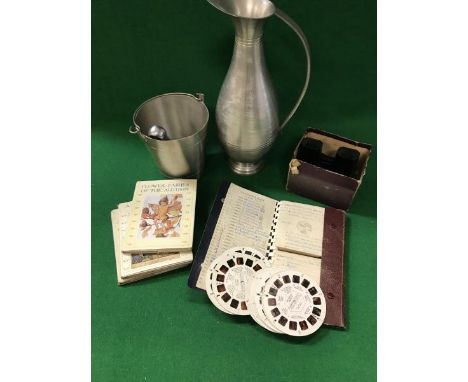 A Sawyer's Viewmaster, together with a Viewmaster album containing various reels and various loose reels, to include Jim Hens