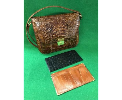 A crocodile skin crossover handbag stamped to the inside "Genuine Season Crocodile Skin", together with a leather wallet and 