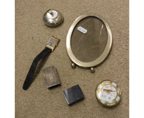 A 9 carat gold cased wristwatch, together with a silver match box holder, three trinket boxes and a photograph frame