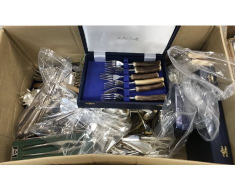 A collection of various plated cutlery, plated name place card holders as tortoise and apples, mother of pearl and horn spoon