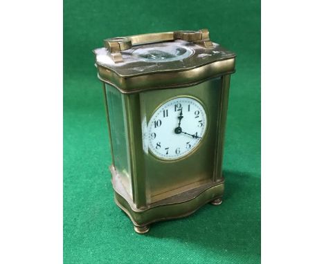 An early 20th Century brass five glass carriage clock, the dial set with Arabic numerals