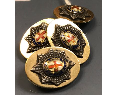 A pair of 9 carat gold and enamel decorated Coldstream Guards cufflinks of oval form, 13.3 g overall