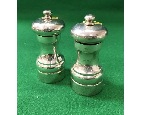 Five silver pepper grinders "Peter Piper" by Park Green (by David R Mills, London 1990)