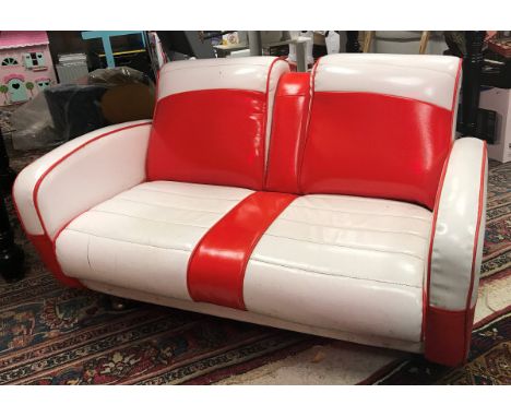 A Fine Line child's simulated red and white leather two seat sofa