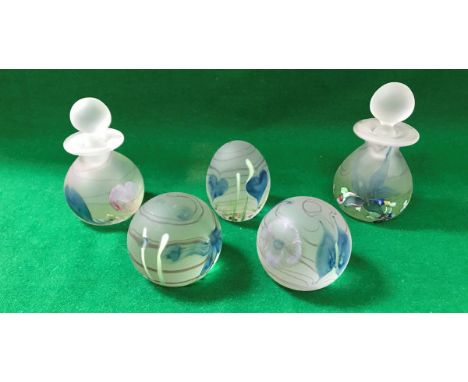 A collection of Caithness paperweights to include "Iris" paperweight No'd. 31/750, "Butterfly" paperweight No'd. 173/750, "Ju
