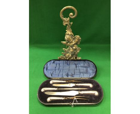 An early 20th Century cased silver mounted pistol grip five piece carving set, the blades of the knives stamped "Harrison Bro