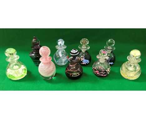 A collection of Caithness perfume bottles comprising "Zenith" No'd. 24/150, "Samarkand" No'd. 127/150, "Enchanté" No'd. 178/2