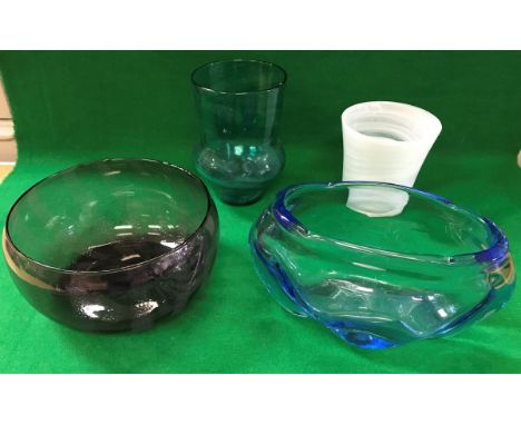 A James Hogan for Whitefriars lobed jardinier in blue, together with a Portmeirion purple glass bowl, a further green marbled