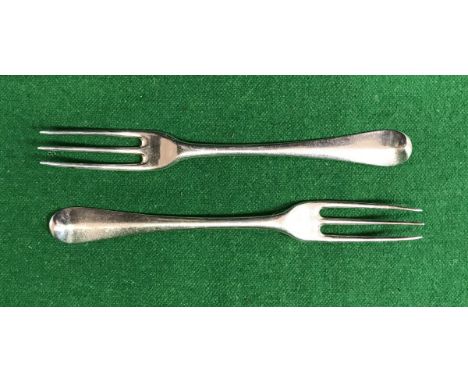 A set of twelve silver three pronged dessert forks (marks rubbed possibly London 1719), together with a silver plated fork to