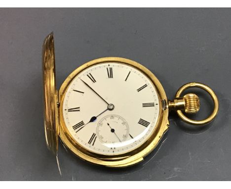 An 18 carat gold cased full hunter pocket watch, the key less movement with repeat by J W Benson, the back plate inscribed "J