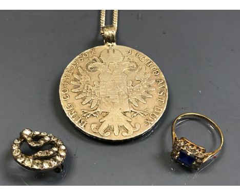 A 9 carat gold topaz ring, Marie Therese coin pendant and a paste "snake" brooch