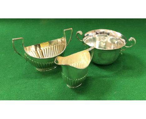 A late Victorian silver two-handled porringer of inverted bell form (Sheffield 1899), together with an Edwardian silver sugar