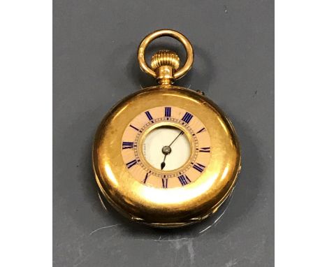 A ladies 18 carat gold cased half hunter pocket watch, the movement by J W Benson, the back plate inscribed "J W Benson 25 Ol