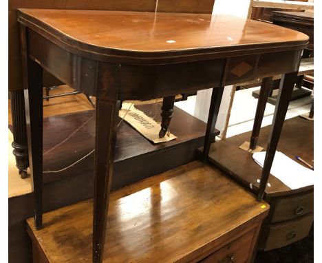 A 19th Century mahogany and inlaid fold over card table on square tapered legs together with a late George III mahogany tea t