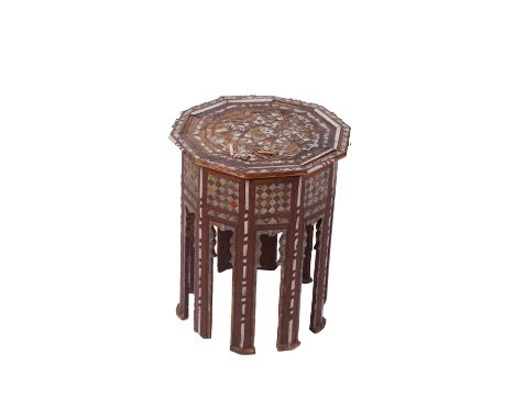 A Moorish mother of pearl inlaid octagonal table 52cm high, 43cm wide 