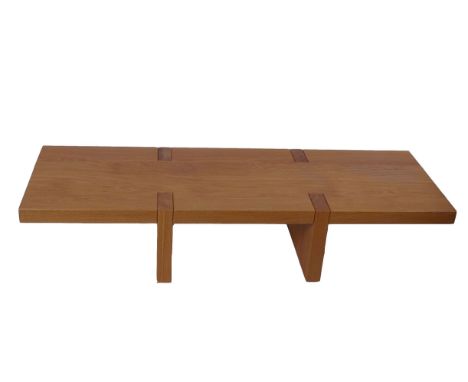 A modern Benchmark light oak coffee table with rectangular top, makers plate numbered 5665 (150cm wide, 31cm high); together 