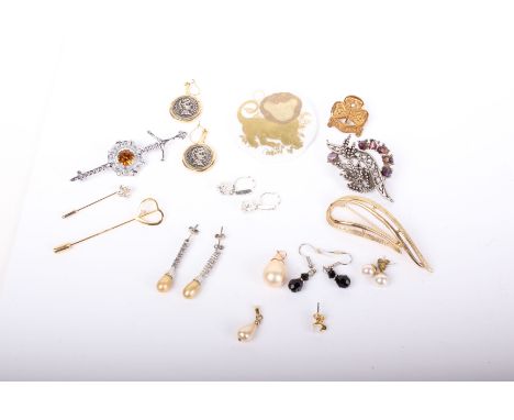 A collection of costume jewellery to include; Two rows of bloomed facetted glass beads, two imitation-pearl necklaces,a gold-