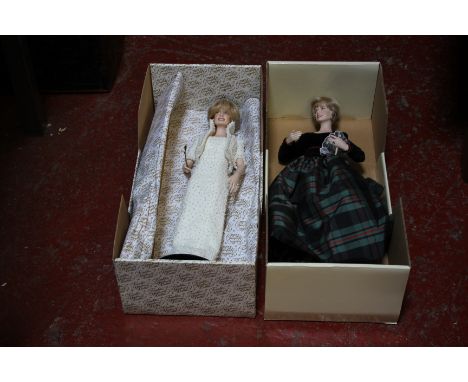 Two boxed Lady Diana porcelain portrait dolls by Franklin Mint. Approx 50cm tall 