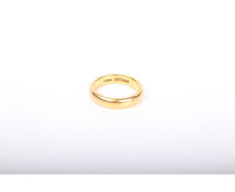 A late Victorian 22ct gold wedding band, Birmingham 1901, size R, 9.9g.