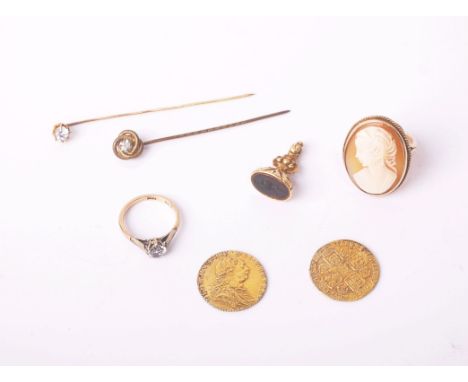 A small collection of jewellery comprising; a 19th century chased gold and black onyx fob seal; a Continental gold and paste 