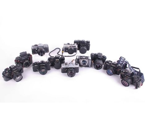 A quantity of vintage 35mm SLR cameras, to include Petriflex V, Ricoh KR10, Halina Paulette, Praktica BMS, Zenit TTL, Chinon 