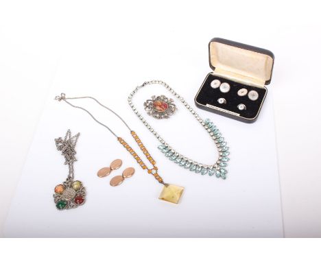 A pair of 9ct gold cuff links, sterling silver stud set (boxed), a Ceard Scottish pendant with chain, three other costume jew