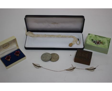 A cultured pearl graduated single row necklace on a 9ct white gold clasp, a freshwater pearl five row necklace and other item