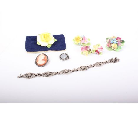 A 'diamante' set bracelet, a cameo brooch, Victorian hard stone brooch and five items of ceramic floral jewellery