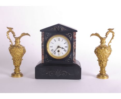 A Victorian slate mantel clock  26cm high, 22cm wide and a pair of gilt ewers (3)
