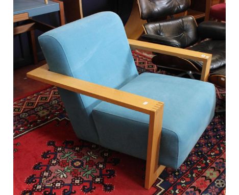 A Benchmark light oak framed armchair with azure upholstery, makers plate numbered 4559, 84cm wide
