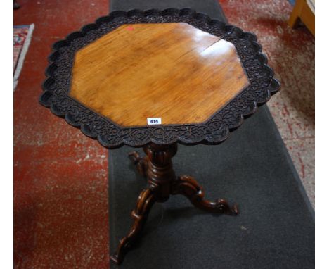 A Victorian round rosewood occasional table on central carved pillar with intricate carved edging to top 60cm diameter 