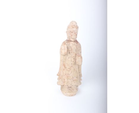 A Chinese stone statue, a figure dressed in robe with hands out stretched. Veined hard stone. Unmarked. Head repaired. 35cm h