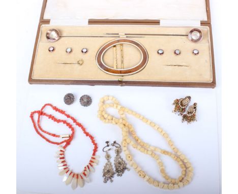 A large enamel on gilt metal oval buckle, two matching hat pins and set of six buttons all with Mother of Pearl centres, case