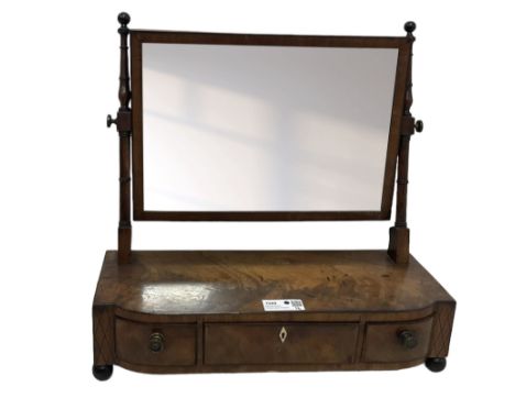 George III mahogany toilet mirror, rectangular plate on ring turned supports with swing action, three drawers with simulated 