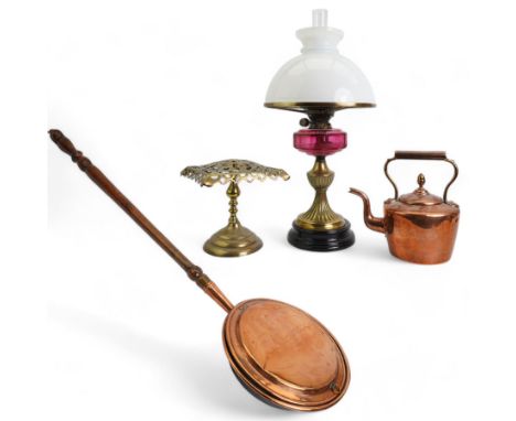 Victorian brass table oil lamp with cranberry glass reservoir and opaque shade, copper kettle, brass trivet and copper warmin
